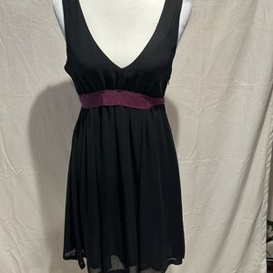American Eagle Outfitters black dress with violet sash/tie.